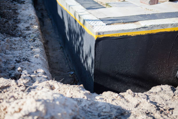 Professional Exterior Waterproofing technician working in Morrisville, NC
